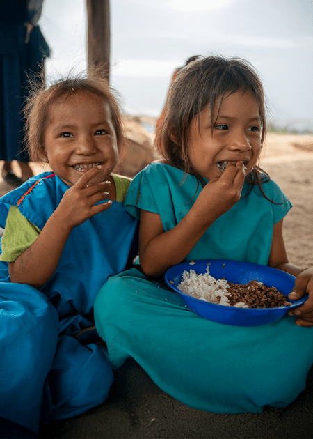 mealemail-landingpg-main-photo two little girls enjoy a bowl of rice