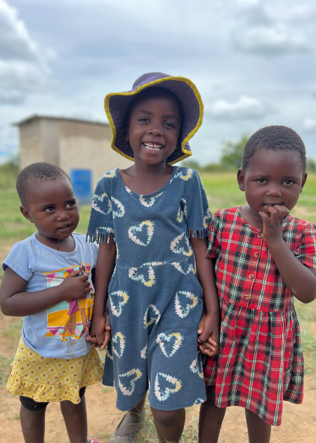 young girls smiling for camera